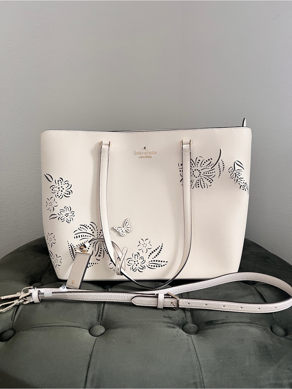 kate spade cream laser-cut floral tote with butterfly detail